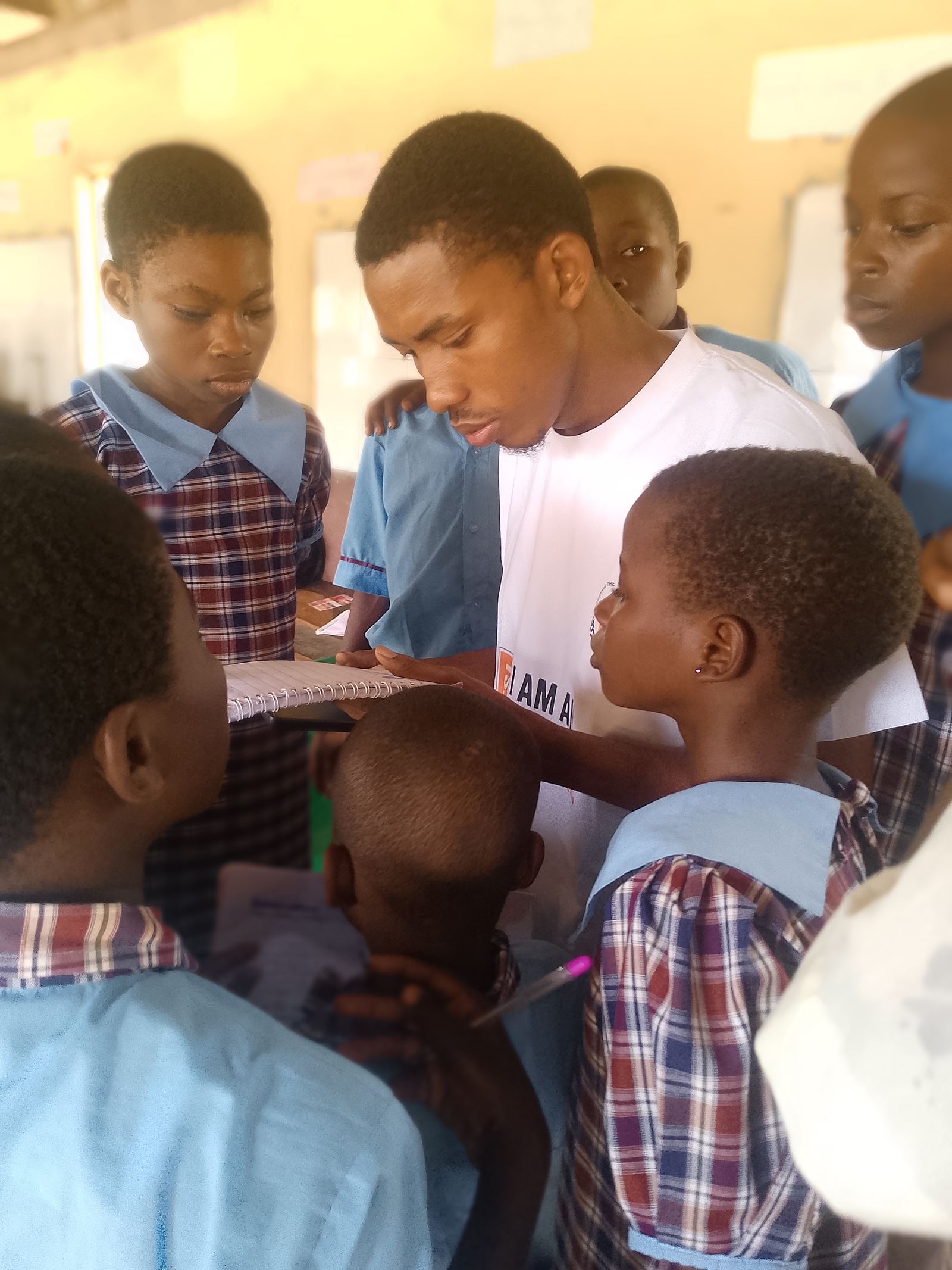 ETSI volunteer mentoring a group of secondary school students up close
