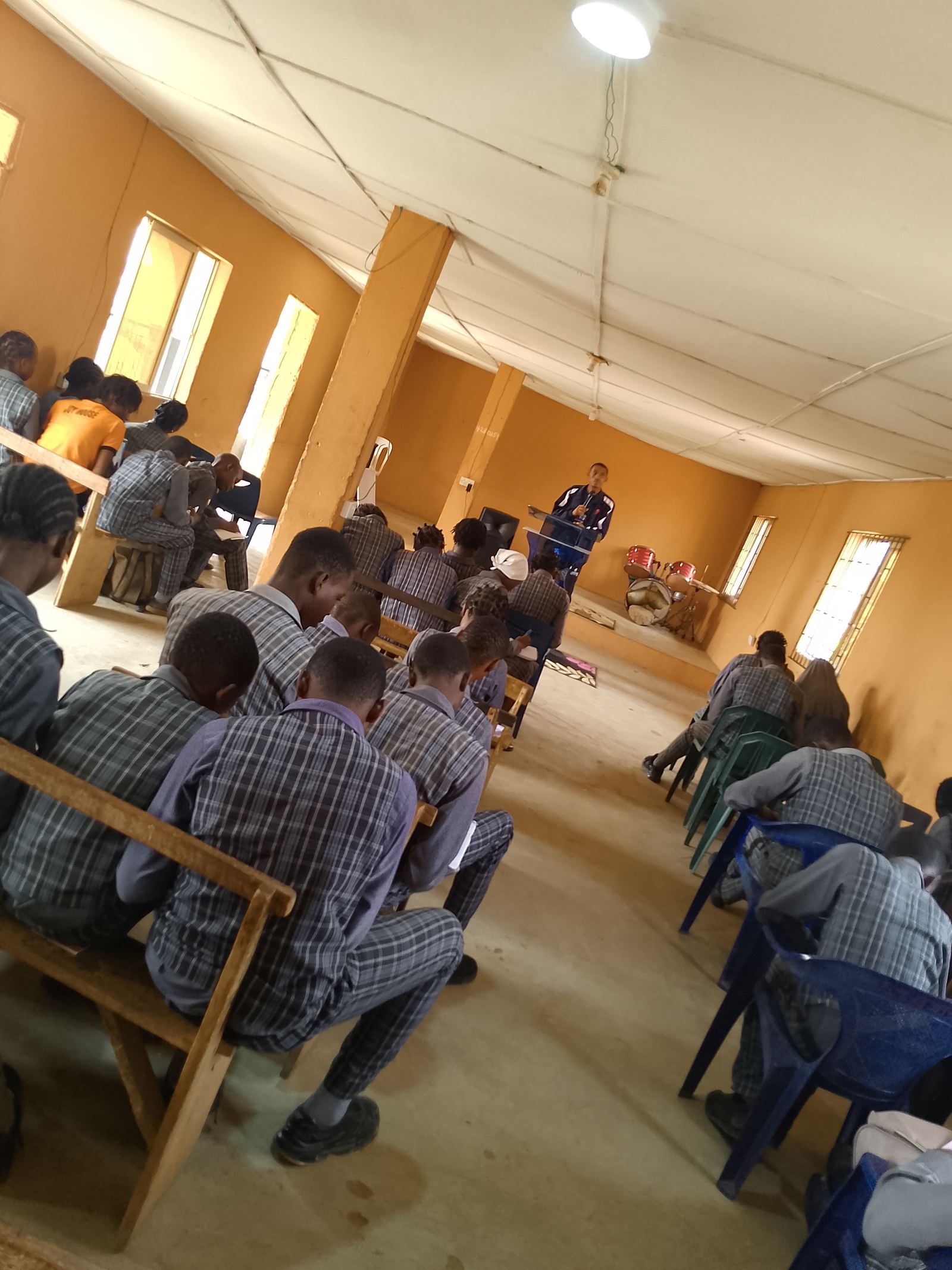 ETSI facilitator addressing students during outreach
