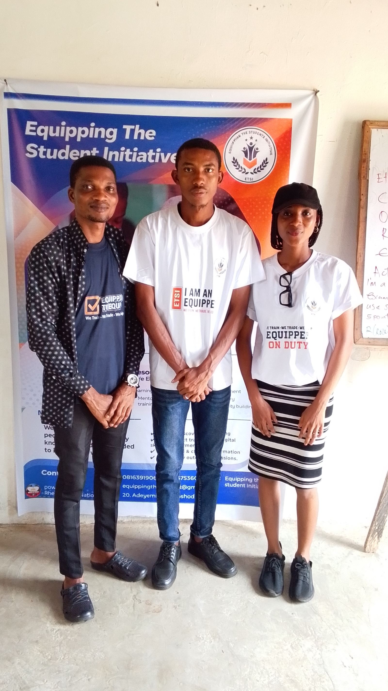 ETSI equipper team members posing with the official ETSI banner